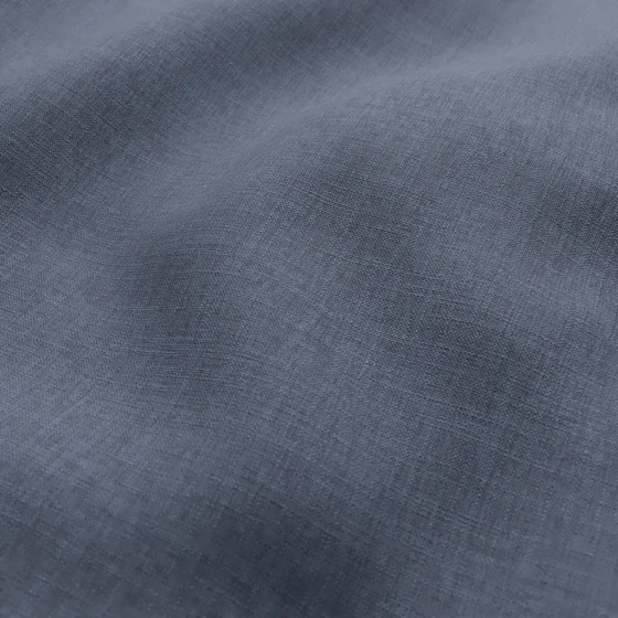 Photo of the fabric Envoy 2 Coast 320cm swatch by James Dunlop Essentials. Use for Curtains, Accessory, Top of Bed. Style of Plain, Texture