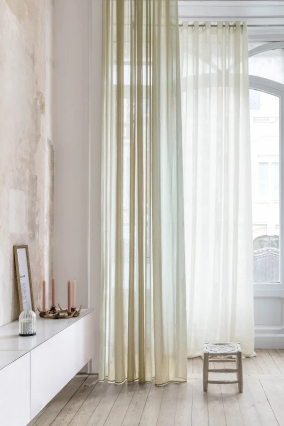 Photo of the fabric Esperanza Shadow in situ by James Dunlop Essentials. Use for Sheer Curtains. Style of Plain, Sheer