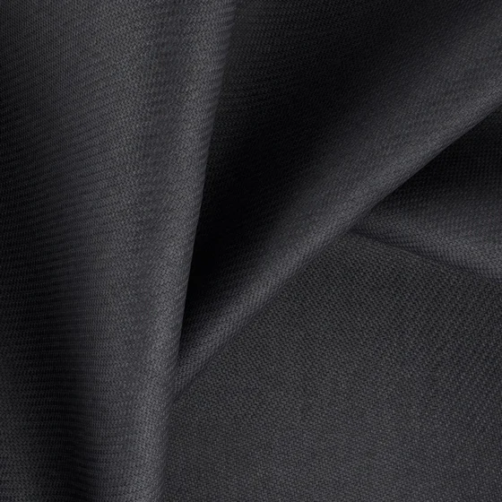 Photo of the fabric Fiji Raven swatch by Zepel. Use for Curtains, Upholstery, Accessory, Top of Bed. Style of Plain, Texture
