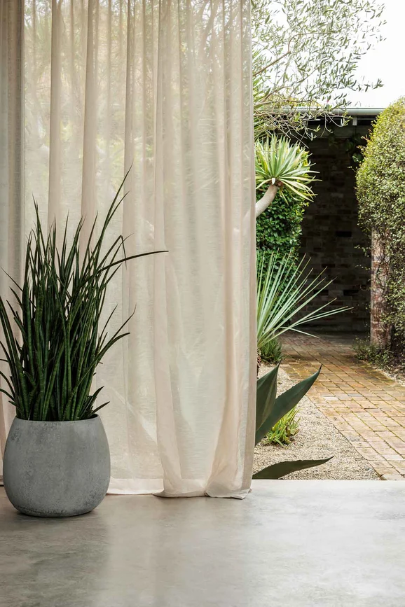 Photo of the fabric Natura Recycled Onyx in situ by Mokum. Use for Sheer Curtains. Style of Plain, Sheer
