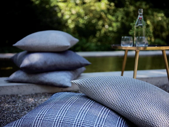 Photo of the fabric Unito 2834 401 in situ by Fischbacher 1819. Use for Upholstery, Accessory. Style of Plain