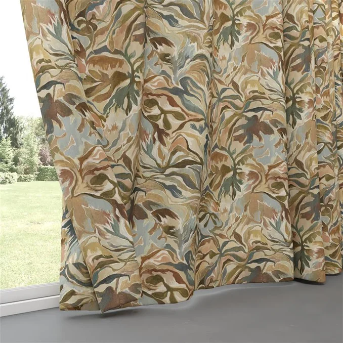 Tropical printed curtains blowing in the breeze
