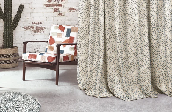 Photo of the fabric Asante V3293 03 in situ by Villa Nova. Use for Curtains. Style of Embroidery