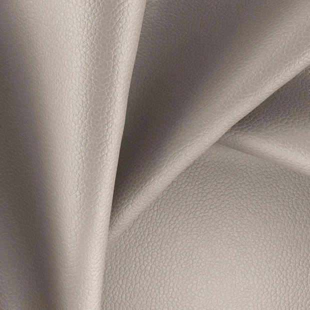 Photo of the fabric Integra Otter swatch by Zepel. Use for Upholstery, Accessory, Top of Bed. Style of Leather And Vinyl, Plain