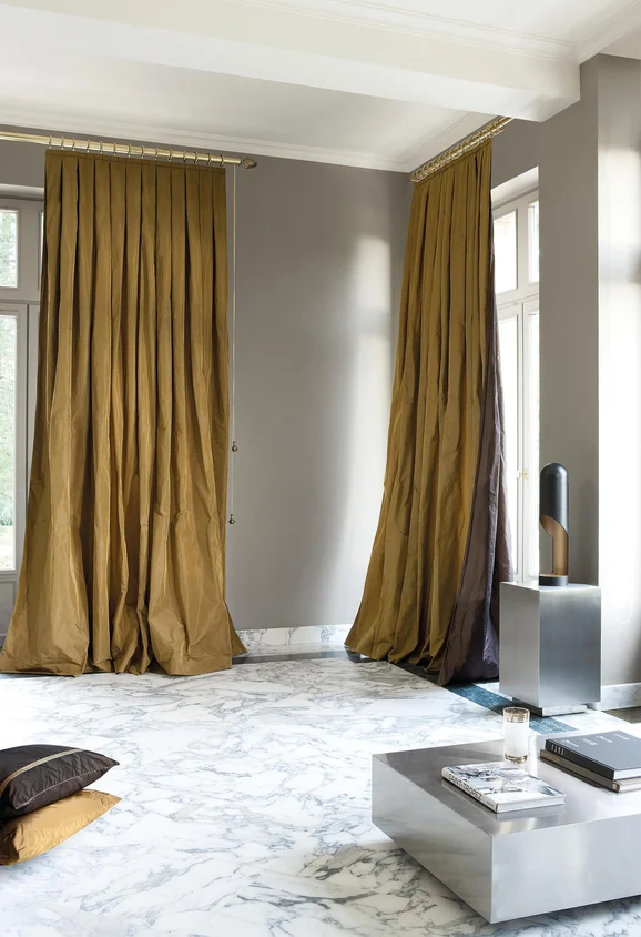 Photo of the fabric Taffy Asparagus - E54 in situ by James Dunlop Essentials. Use for Curtains, Upholstery Light Duty, Accessory, Top of Bed. Style of Plain, Taffeta
