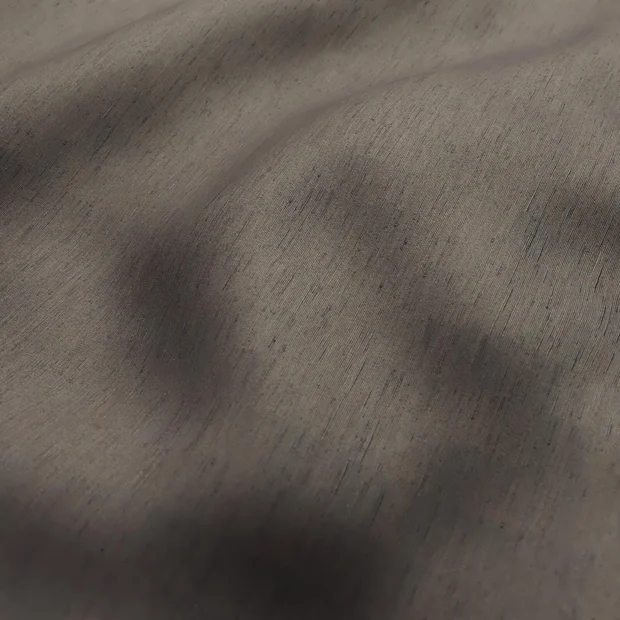 Photo of the fabric Silk Road Truffle swatch by James Dunlop Essentials. Use for Curtains, Accessory. Style of Plain, Texture