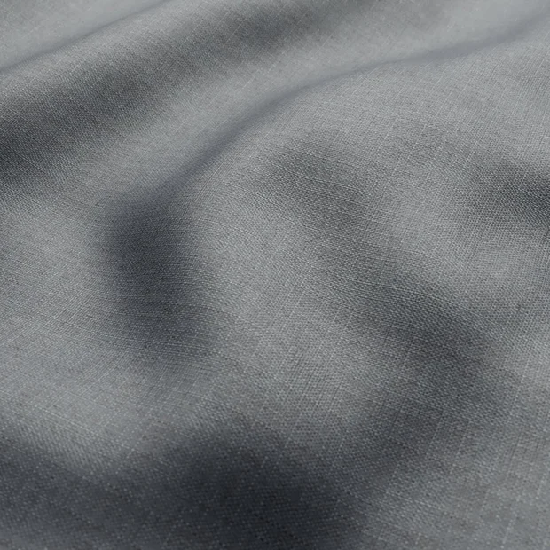 Photo of the fabric Stallion 2 UC Storm swatch by James Dunlop Essentials. Use for Curtains, Accessory. Style of Plain, Texture