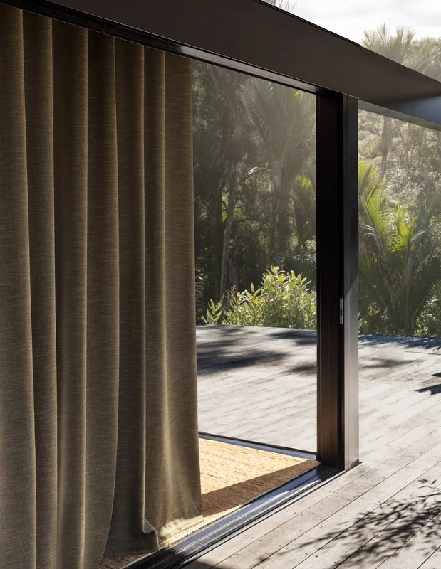 Photo of the fabric Banksia Slate in situ by James Dunlop. Use for Curtains, Accessory, Top of Bed. Style of Plain, Texture