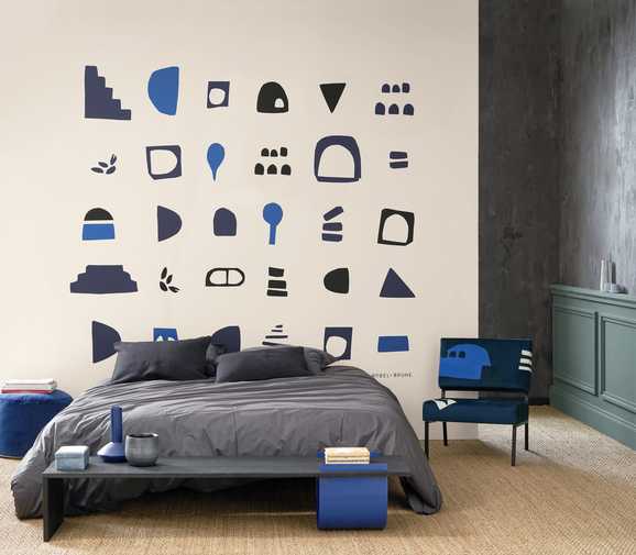 Photo of the fabric Hieroglyphes Panel 8632 8632 68 27 in situ by Casadeco. Use for Wall Covering, Wall Panel/Mural. Style of Abstract