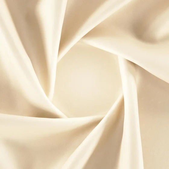 Photo of the fabric Catwalk Putty swatch by Zepel. Use for Curtains, Upholstery Light Duty, Accessory, Top of Bed. Style of Plain, Taffeta