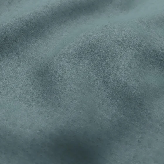 Photo of the fabric Luxo Teal swatch by Zepel. Use for Curtains, Accessory, Top of Bed. Style of Chenille, Plain
