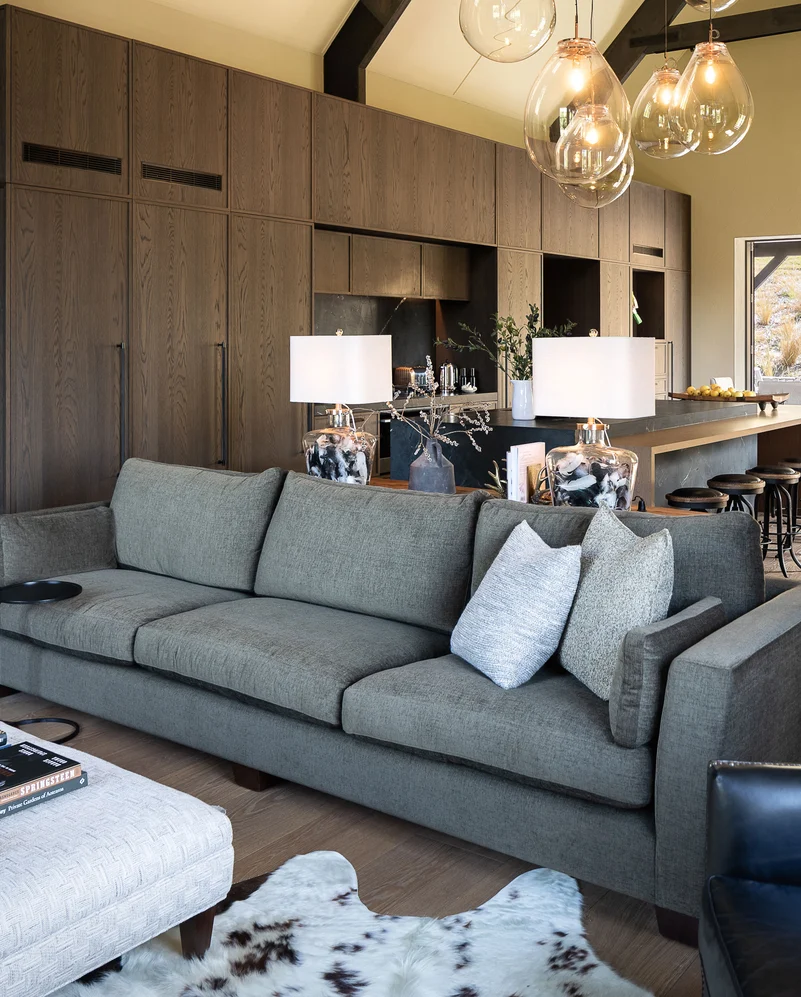 Couch in Tahiti colour Olive by Mokum FibreGuard, cushions in Staunch by James Dunlop FibreGuard | Image Michelle Weir