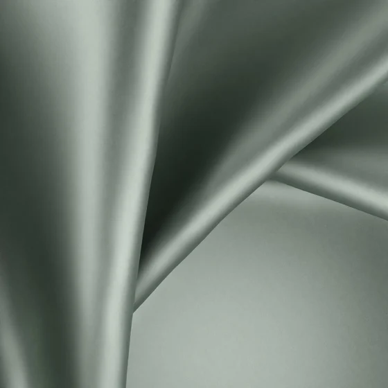 Photo of the fabric Moonbeam Celadon swatch by Zepel. Use for Curtains, Upholstery, Accessory, Top of Bed. Style of Plain, Taffeta