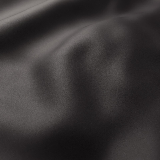 Photo of the fabric Sandman Onyx swatch by Zepel. Use for Curtains, Accessory, Top of Bed. Style of Dim Out, Plain
