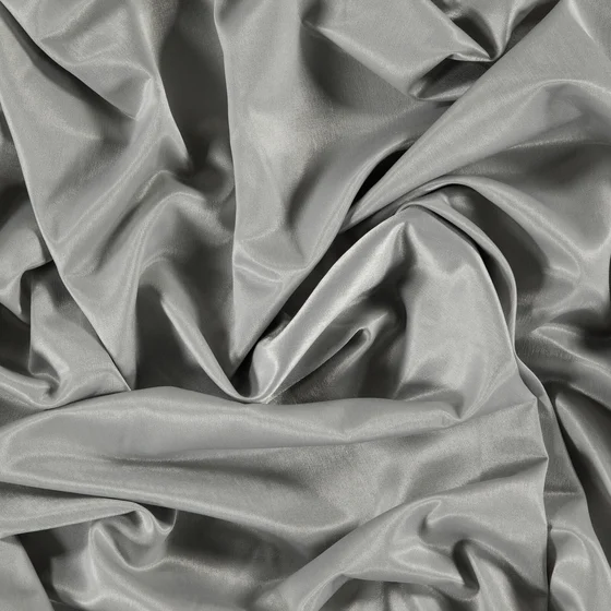 Photo of the fabric Sunbeam Haze swatch by Zepel. Use for Curtains, Accessory, Top of Bed. Style of Plain, Taffeta