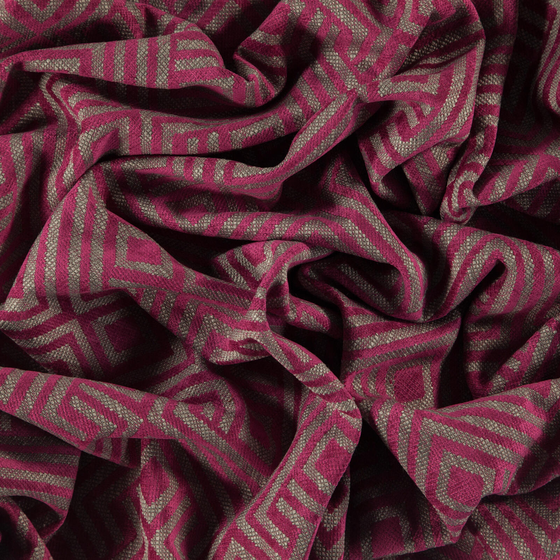 Photo of the fabric Lucie Magenta swatch by Zepel FibreGuard. Use for Curtains, Upholstery, Accessory, Top of Bed. Style of Geometric, Jacquard