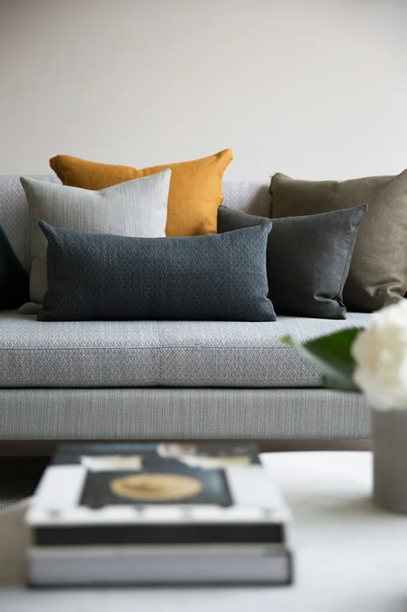 Photo of the fabric Maro Tourmaline in situ by James Dunlop. Use for Upholstery, Accessory. Style of Plain, Texture