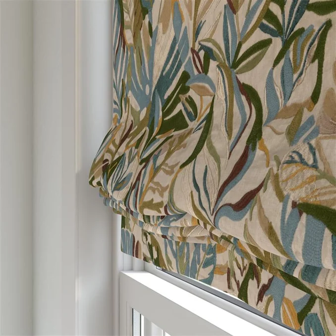 Tropical embroidered roman blinds in traditional interior setting
