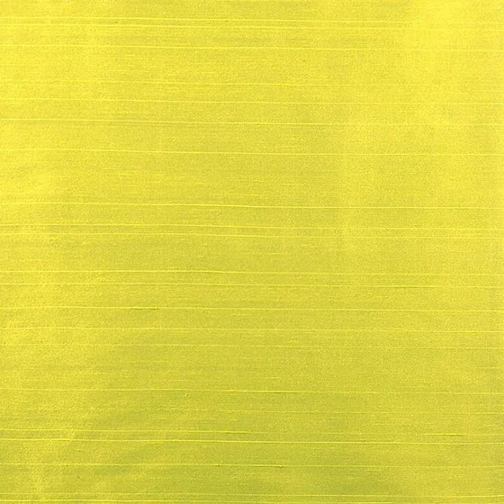 Photo of the fabric Luxe Chartreuse swatch by James Dunlop Essentials. Use for Curtains, Accessory, Top of Bed. Style of Plain, Texture