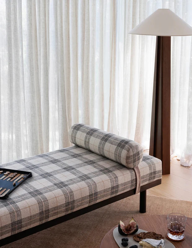 Photo of the fabric Jinda River in situ by James Dunlop. Use for Upholstery, Accessory, Top of Bed. Style of Checks, Texture