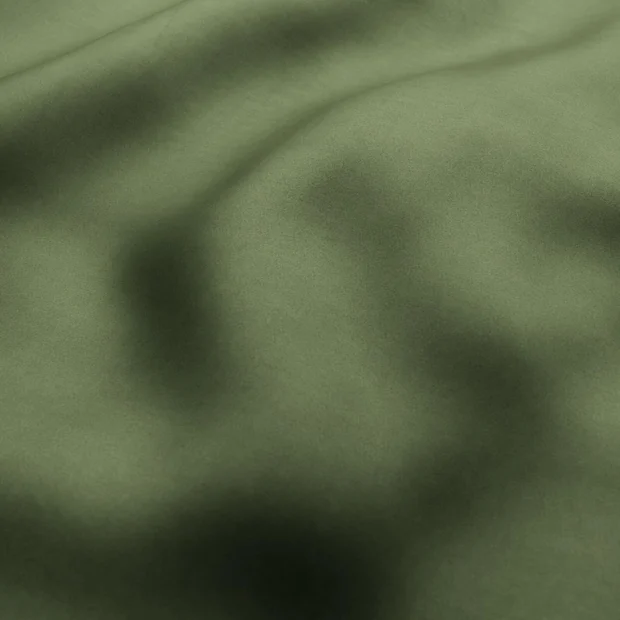 Photo of the fabric Warlock Olive swatch by Zepel. Use for Curtains, Upholstery, Accessory, Top of Bed. Style of Plain, Velvet