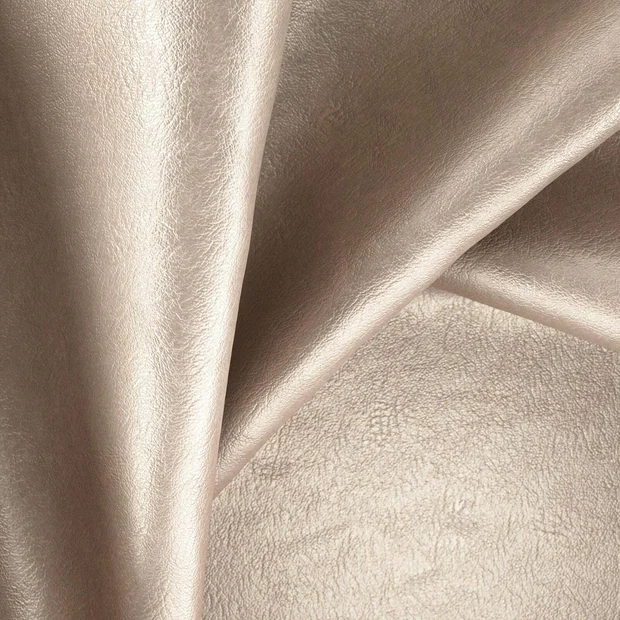 Photo of the fabric Tanning Metallic Plaza swatch by Zepel. Use for Upholstery, Accessory, Top of Bed. Style of Leather And Vinyl, Plain