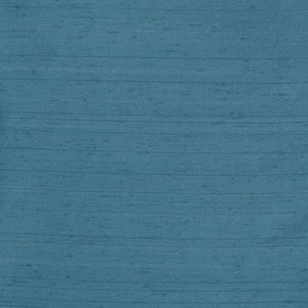 Photo of the fabric Luxe Teal swatch by James Dunlop Essentials. Use for Curtains, Accessory, Top of Bed. Style of Plain, Texture
