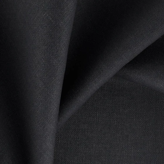 Photo of the fabric Kanvas Ebony swatch by Zepel FibreGuard. Use for Curtains, Upholstery, Accessory, Top of Bed. Style of Plain, Taffeta