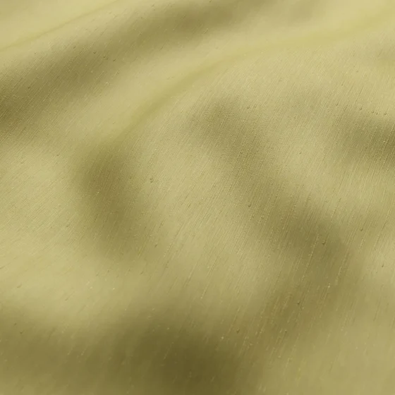 Photo of the fabric Silk Road Golden Olive swatch by James Dunlop Essentials. Use for Curtains, Accessory. Style of Plain, Texture