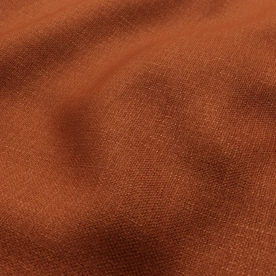 Photo of the fabric Carrara Rust swatch by Zepel. Use for Upholstery, Accessory. Style of Plain, Taffeta