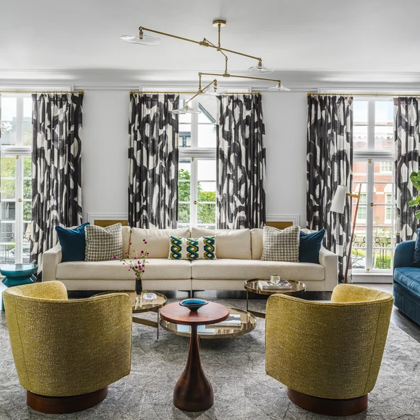 Curtains in Abstraction colour Basalt by Mokum, cushions in Boxgrove colour Peacock & Jackie colour Dalmation by Zinc Textile | Photograph by Christopher Stark