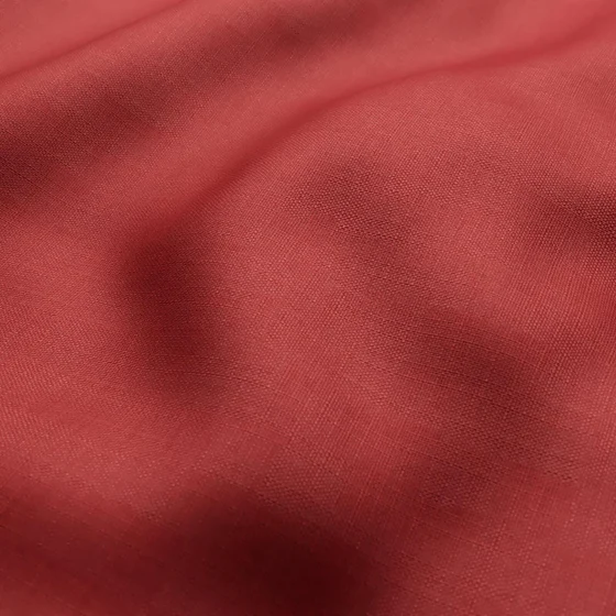 Photo of the fabric Stallion 2 Blackout Vino swatch by James Dunlop Essentials. Use for Curtains. Style of Plain, Texture
