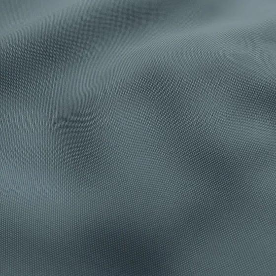 Photo of the fabric Oakley FR Teal swatch by James Dunlop. Use for Curtains. Style of Plain, Texture