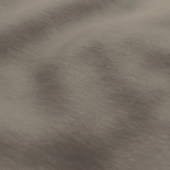 Photo of the fabric Eternal Jute swatch by Mokum. Use for Curtains, Upholstery, Accessory. Style of Plain, Texture