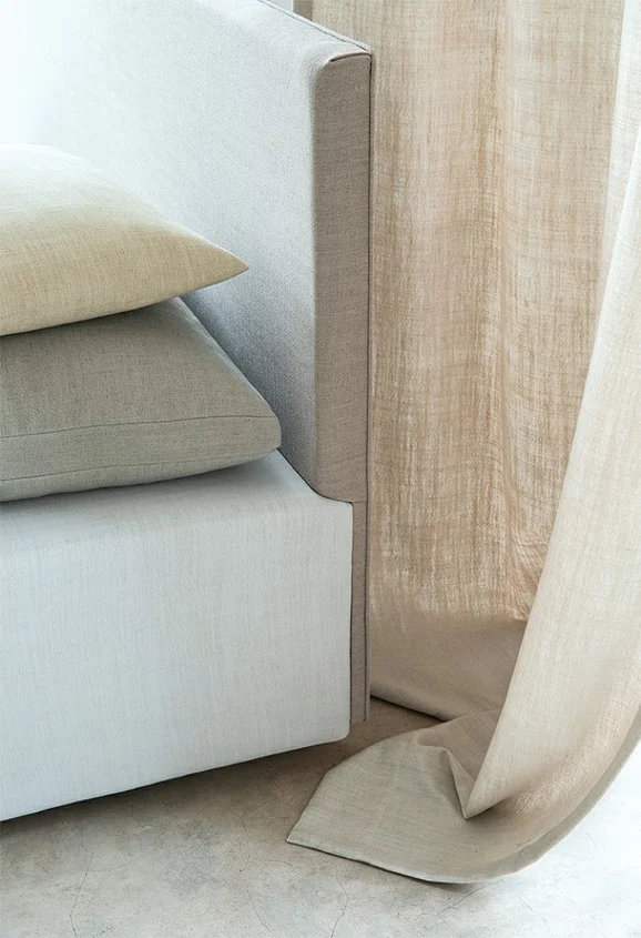 Photo of the fabric Matheson Mermaid in situ by James Dunlop Essentials. Use for Curtains, Upholstery, Accessory, Top of Bed. Style of Plain, Texture