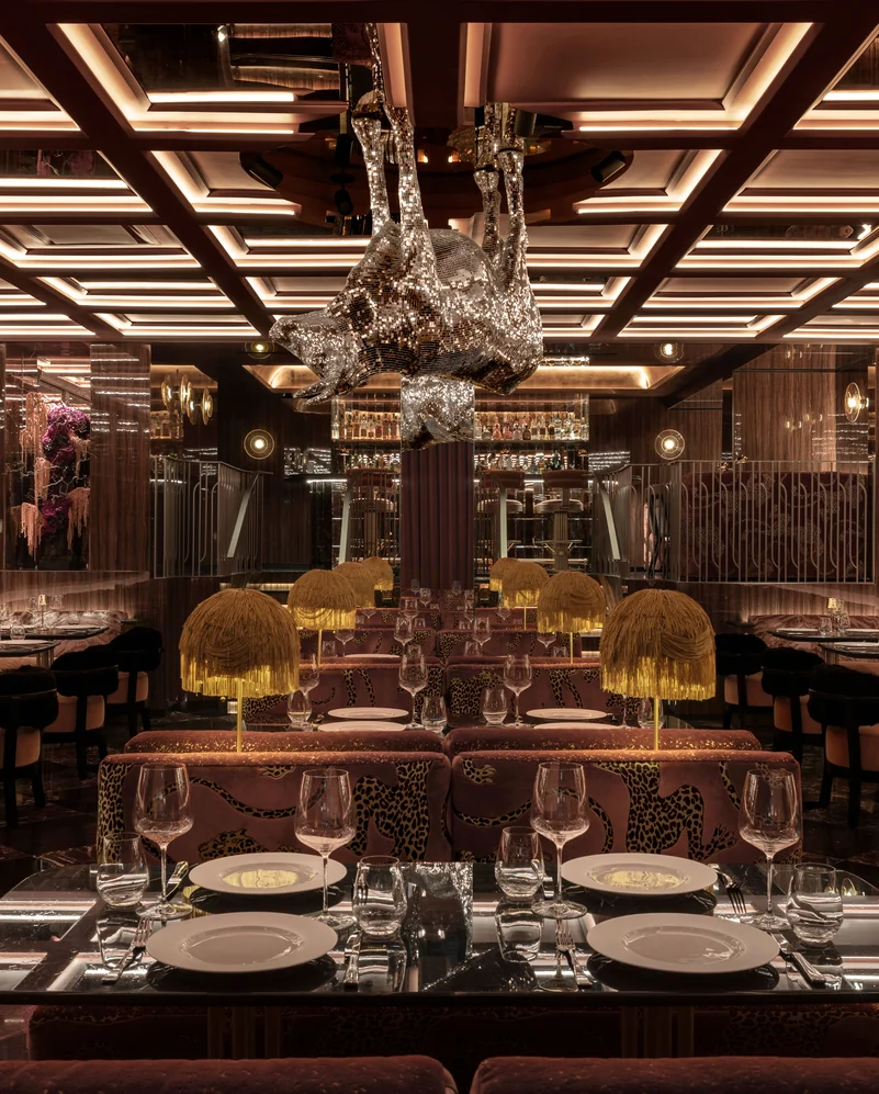 Banquette seating in Bengal Tiger colour Whisky & Panthera colour Whisky, both by Catherine Martin by Mokum | Photograph by Britney Townsend