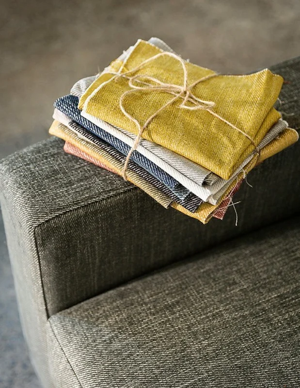 Photo of the fabric Brooklyn Gravel in situ by James Dunlop. Use for Upholstery, Accessory. Style of Plain, Texture