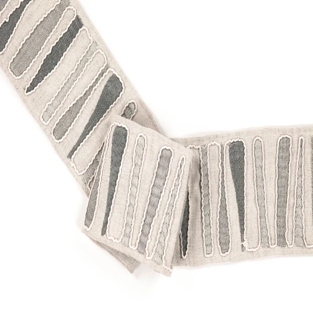 Photo of the fabric Abstract Border T106 02 swatch by Villa Nova. Use for Trim
