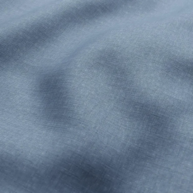 Photo of the fabric Kidglove Denim swatch by Zepel FibreGuard. Use for Curtains, Upholstery, Accessory, Top of Bed. Style of Plain, Taffeta