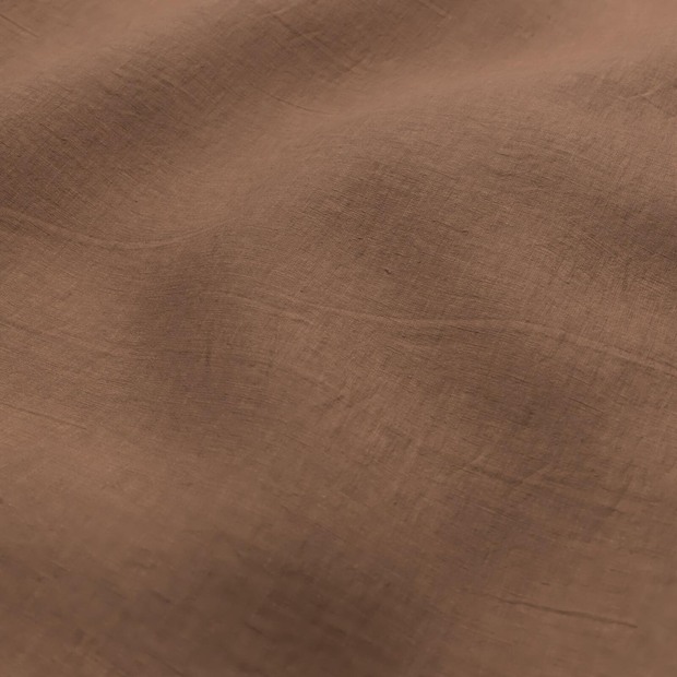 Photo of the fabric Satori Stonewash Burnt Orange swatch by Mokum. Use for Curtains, Upholstery Light Duty, Accessory, Top of Bed. Style of Plain, Texture