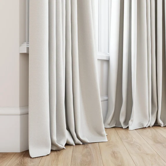 Photo of the fabric Trailblazer Ivory swatch by James Dunlop FibreGuard. Use for Curtains, Upholstery, Accessory, Top of Bed. Style of Texture, Traditional