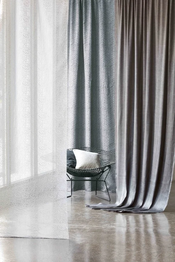 Photo of the fabric Roche FR V3216 05 in situ by Villa Nova. Use for Curtains, Accessory, Top of Bed. Style of Geometric, Taffeta