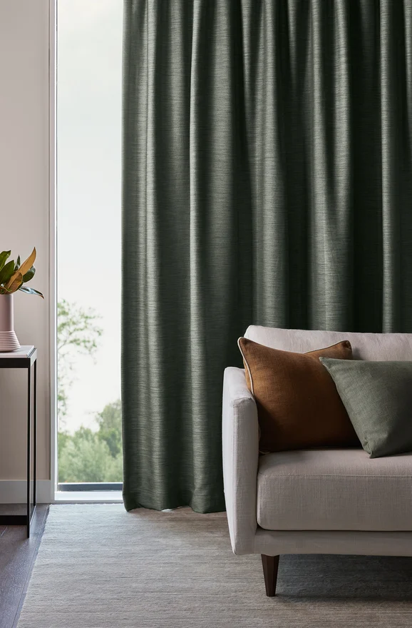 Photo of the fabric Borneo Uncoated Salt in situ by James Dunlop. Use for Curtains, Accessory, Top of Bed. Style of Stripe