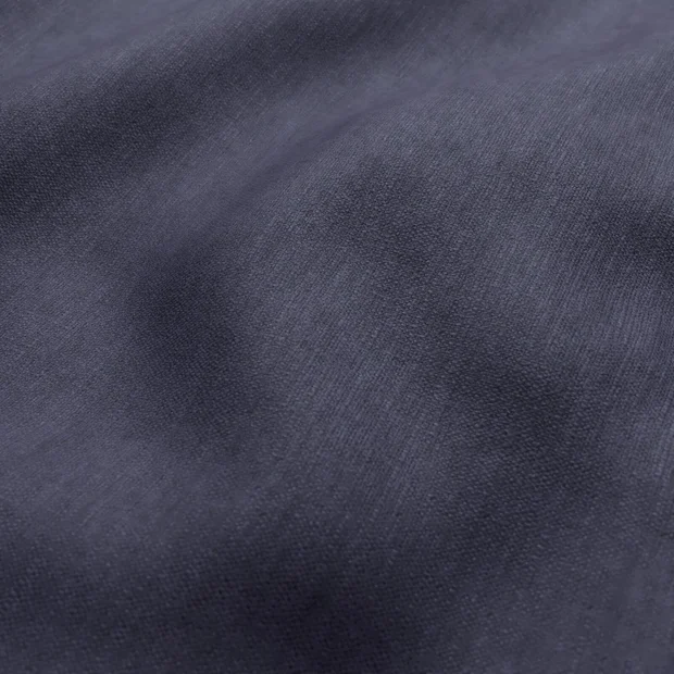 Photo of the fabric Colourwash Navy swatch by Zepel FibreGuard. Use for Curtains, Upholstery, Accessory, Top of Bed. Style of Plain, Texture