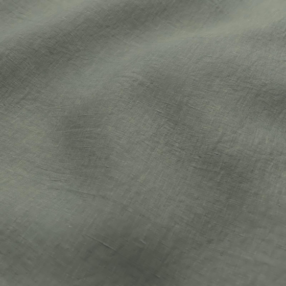 Photo of the fabric Satori Stonewash Celadon swatch by Mokum. Use for Curtains, Upholstery Light Duty, Accessory, Top of Bed. Style of Plain, Texture