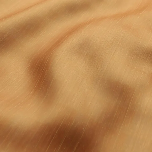 Photo of the fabric Luxe Terracotta swatch by James Dunlop Essentials. Use for Curtains, Accessory, Top of Bed. Style of Plain, Texture