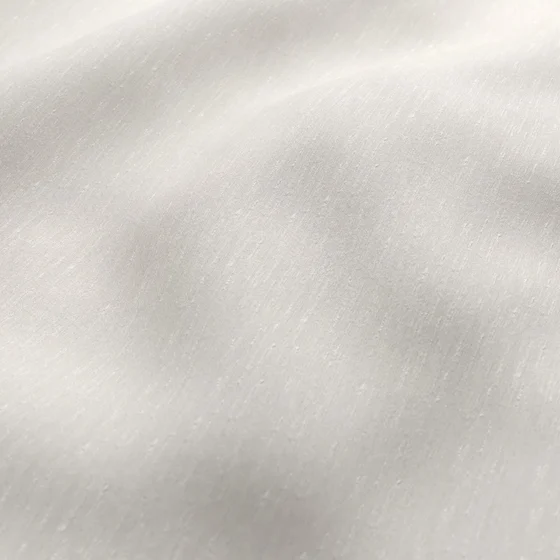 Photo of the fabric Maharaja II Ivory swatch by James Dunlop Essentials. Use for Curtains, Upholstery Light Duty, Accessory, Top of Bed. Style of Plain, Texture