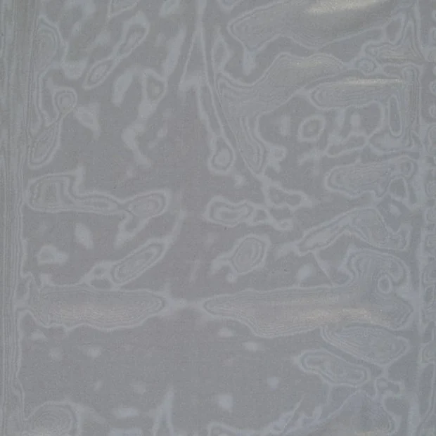Photo of the fabric Silken Horizon swatch by Zepel. Use for Sheer Curtains. Style of Plain, Sheer