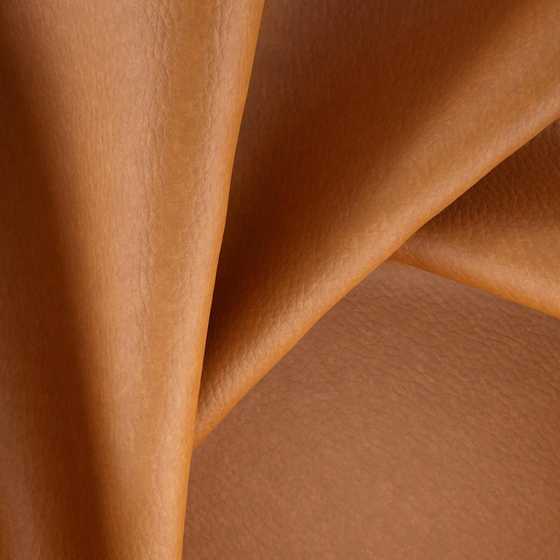 Photo of the fabric Bonanza Sienna swatch by Zepel. Use for Upholstery. Style of Leather And Vinyl, Plain
