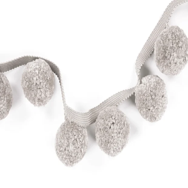 Photo of the fabric Big Poms Braid T93 02 swatch by Villa Nova. Use for Trim